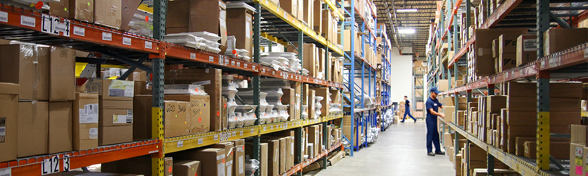 Havtech Supply warehouse employees fulfilling HVAC parts orders in 90,000 sq ft facility